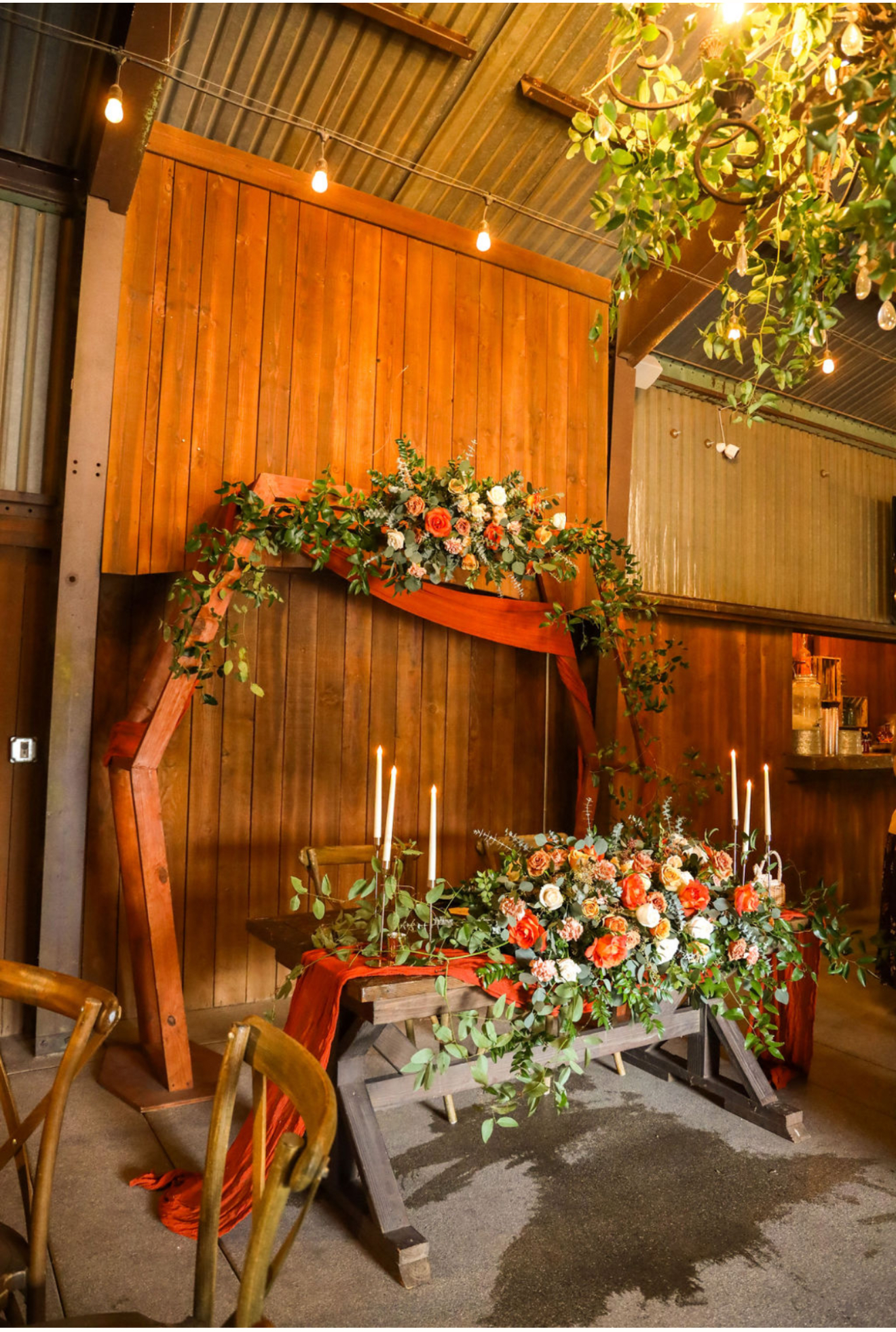 Rustic barn wedding arch