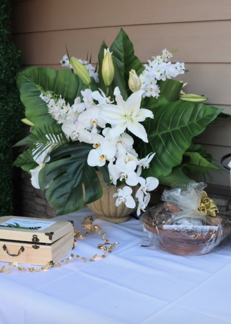 Elegant white orchid and lily arrangement